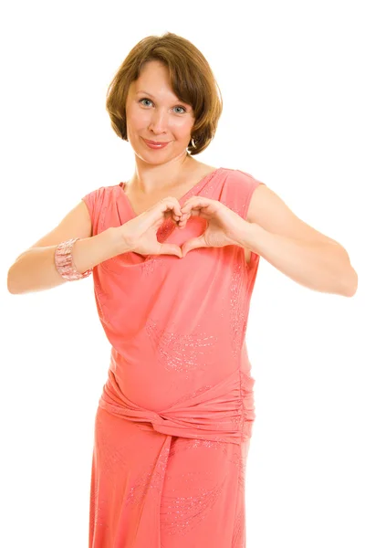 A girl with a heart on a white background. — Stock Photo, Image