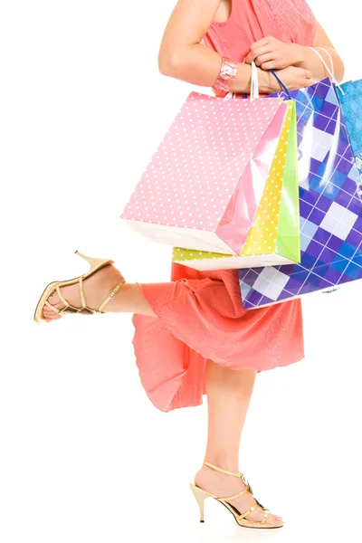 Дівчина з покупками на білому тлі . — стокове фото