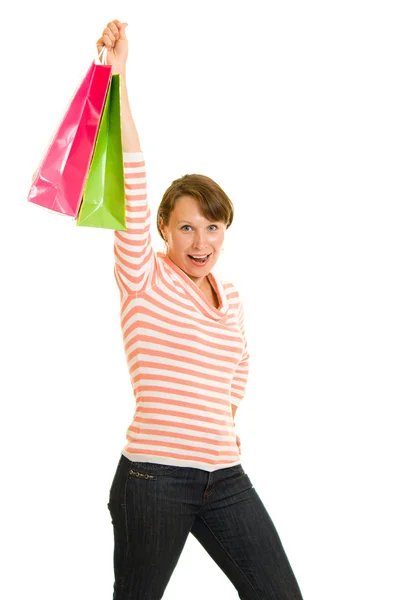 Девушка с покупками на белом фоне . — стоковое фото