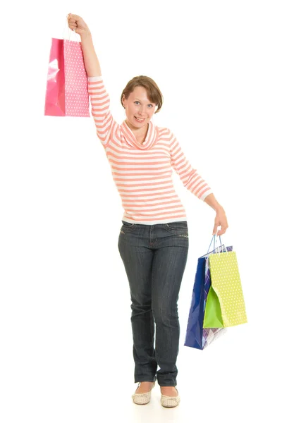 Девушка с покупками на белом фоне . — стоковое фото