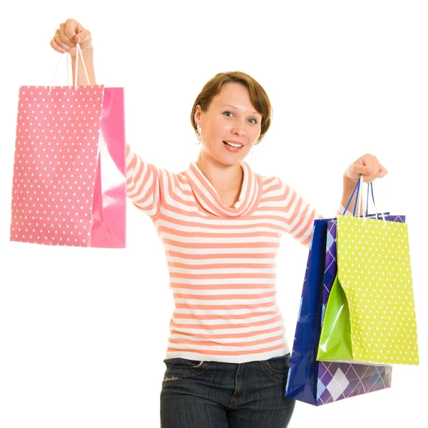 Chica con compras sobre fondo blanco . — Foto de Stock