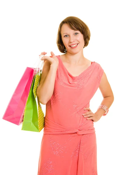 Girl with shopping on white background. Royalty Free Stock Images