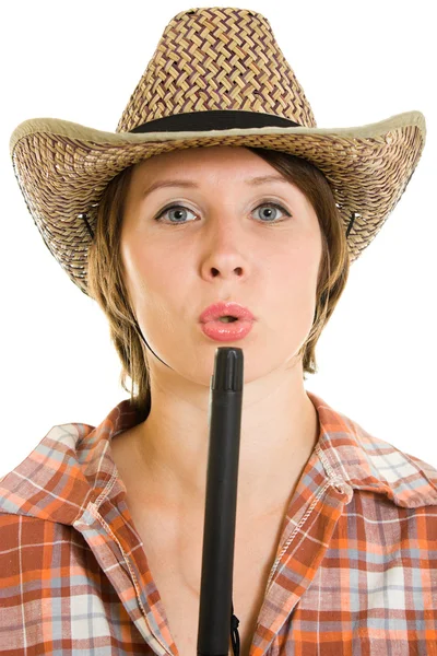 Cowboy donna con una pistola su uno sfondo bianco . — Foto Stock