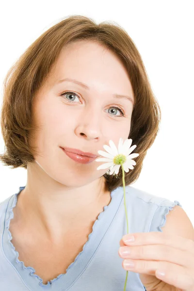 Girl with daisies on a white background. — Stockfoto