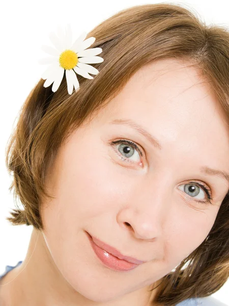 Mädchen mit Blume im Haar. — Stockfoto