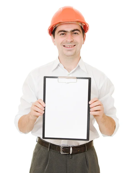 Бизнесмен в шлеме держит планшет . — стоковое фото