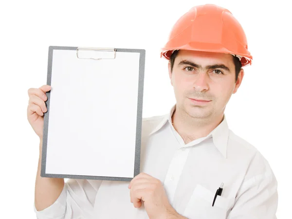 Businessman in helmet holding a tablet. — Stock Photo, Image