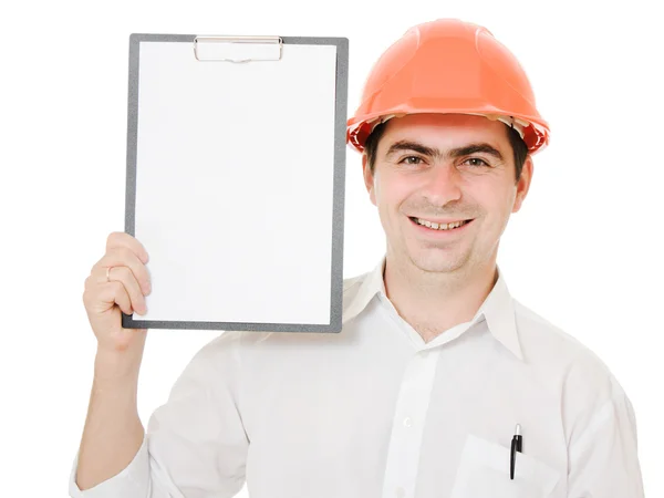 Businessman in helmet holding a tablet. — Stock Photo, Image