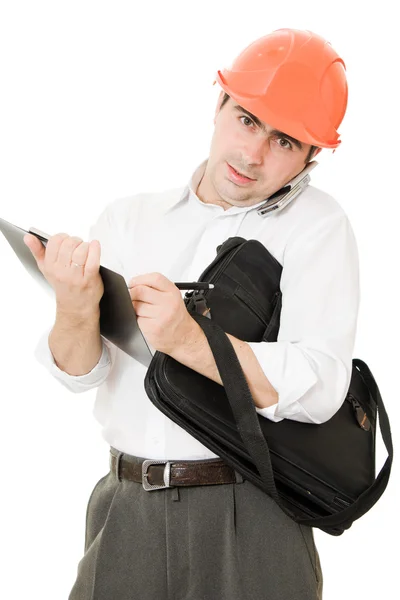 Homme d'affaires occupé dans son casque sur un fond blanc . — Photo
