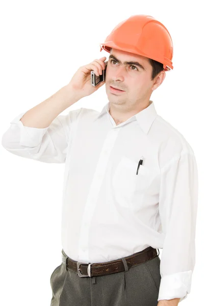 Бизнесмен в шлеме по телефону . — стоковое фото