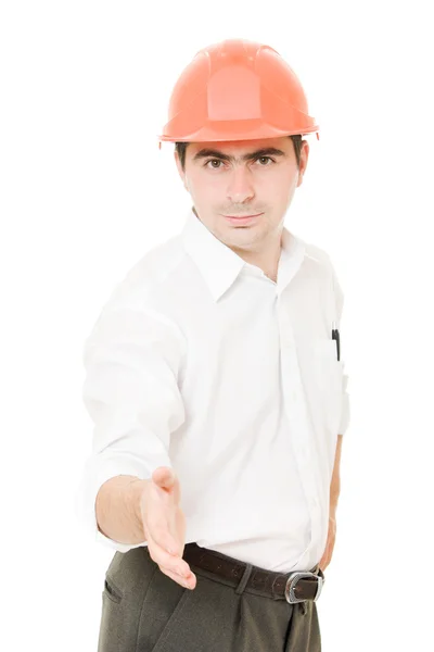 Podnikatel v helmě drží ruku. — Stock fotografie