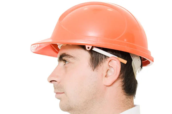 Businessman in a helmet with a cigarette. — Stock Photo, Image