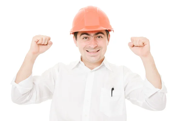 A successful businessman in his helmet on a white background. Royalty Free Stock Photos