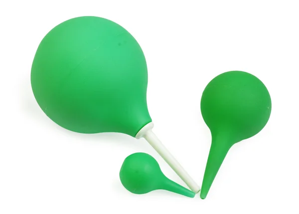 Pêra verde para seringas no fundo branco — Fotografia de Stock