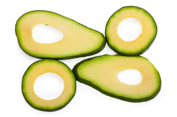 Segment avocado op witte achtergrond — Stockfoto