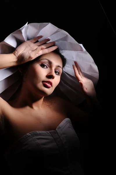 Woman in paper hat — Stock Photo, Image