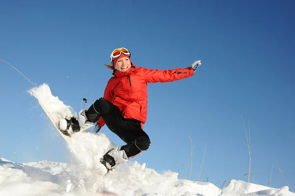 Woman on snowboard — Stock Photo, Image