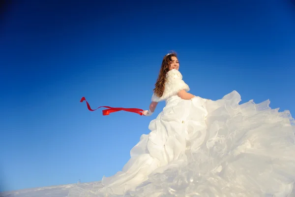 Teenager posing in white wedding dress — Stock Photo, Image