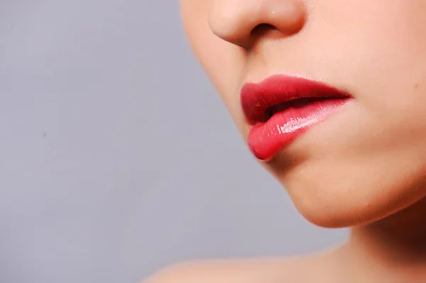 Lábios vermelhos da mulher — Fotografia de Stock