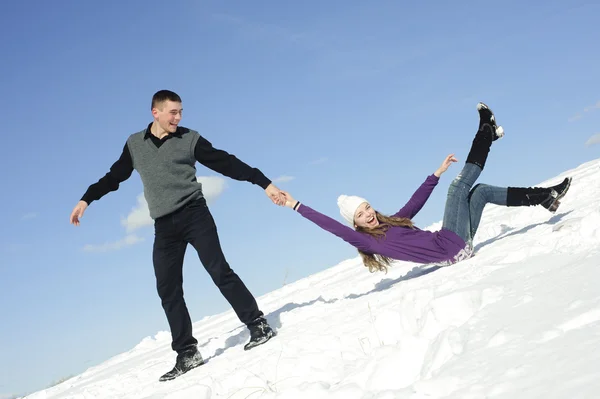 Teenagers on snow field — Stock Photo, Image