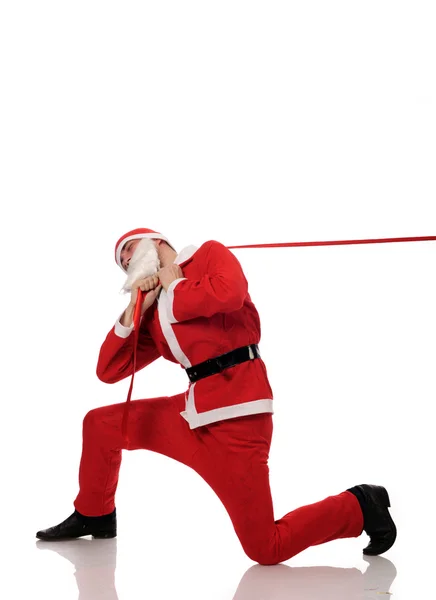 Claus haul red ribbon — Stock Photo, Image