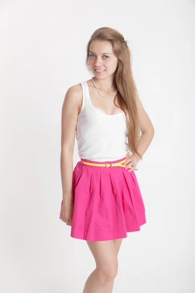 Blondýna v růžové sukně — Stock fotografie