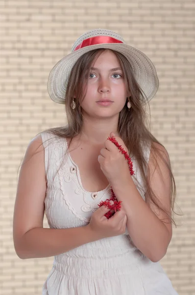 The girl with a coral beads — Stock Photo, Image