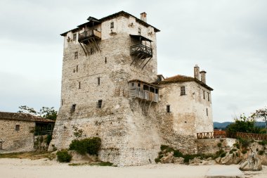 Sentry serf tower on coast, Ouranoupoli clipart