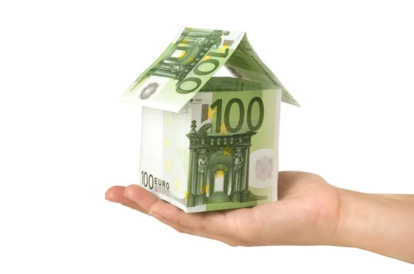 House made from euro bills in hand — Stock Photo, Image