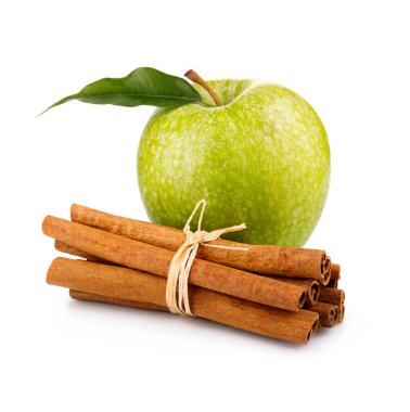 Ripe green apple with cinnamon sticks isolated clipart