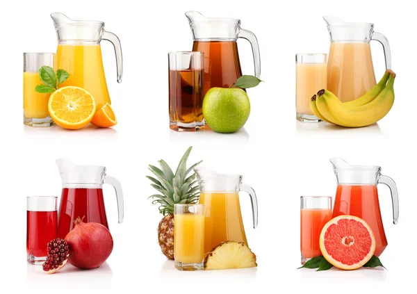 Set of jugs and glasses with tropical fruit juices isolated — Stock Photo, Image