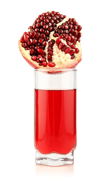 Glass of pomegranate juice with sliced fruits isolated — Stock Photo, Image