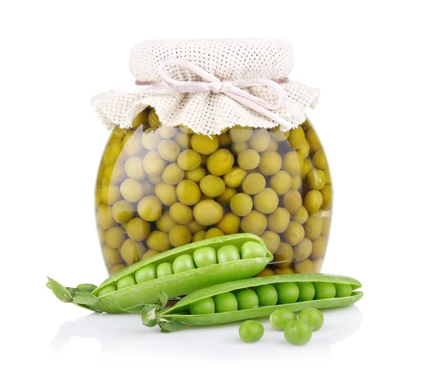 Jar of green pea with fresh pods isolated on white — Stock Photo, Image