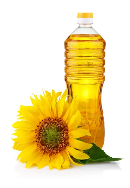 Fles van zonnebloemolie met bloem geïsoleerd op wit — Stockfoto