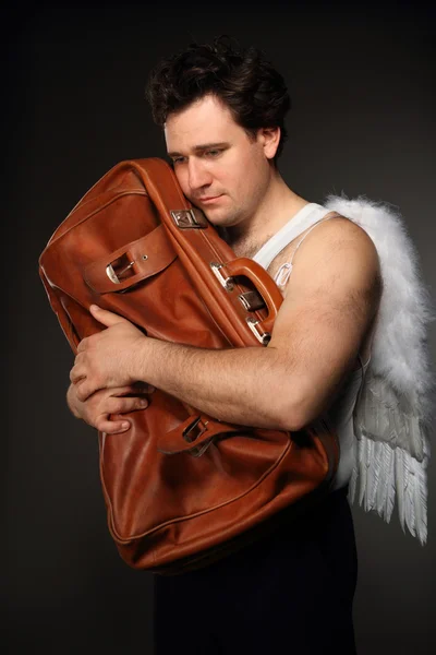 Kahverengi bir çanta Bay angel — Stok fotoğraf