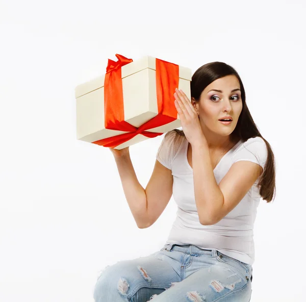 Brunette girl with present — Stock Photo, Image