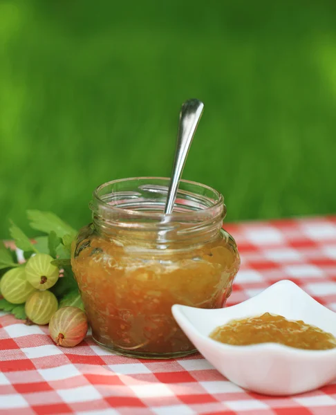 Jar of orange jam — Stock Photo, Image