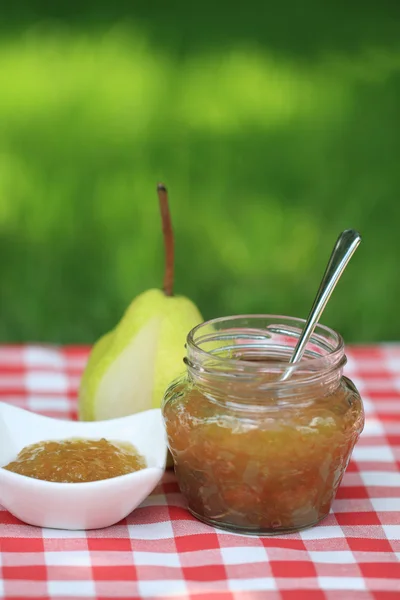 Jar of pear jam — Stock Photo, Image