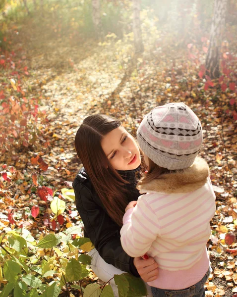 Two sisters in autumn forest — Stock Photo, Image