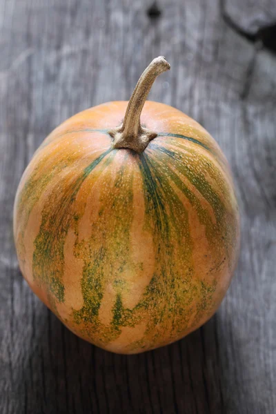 Pumpkin on the wooden background — Stock Photo, Image