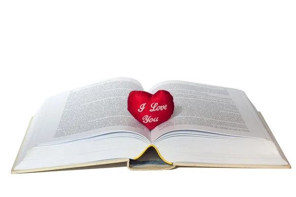 Aufgeschlagenes Buch mit einem Herz auf weißem Hintergrund — Stockfoto
