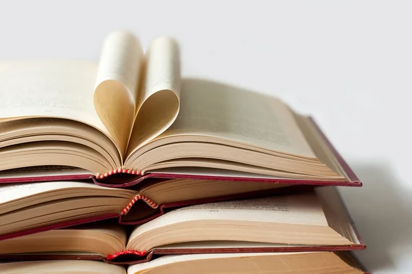 Old books and heart shape — Stock Photo, Image