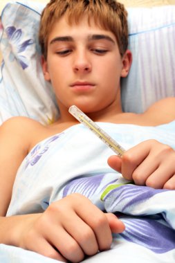 Boy with thermometer clipart