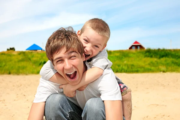 Happy teenager and kid — Stock Photo, Image