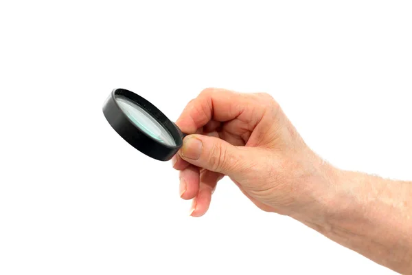 Hand with loupe — Stock Photo, Image