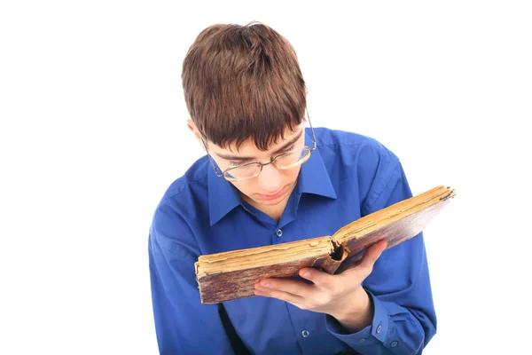 Teenager with old book — Stock Photo, Image