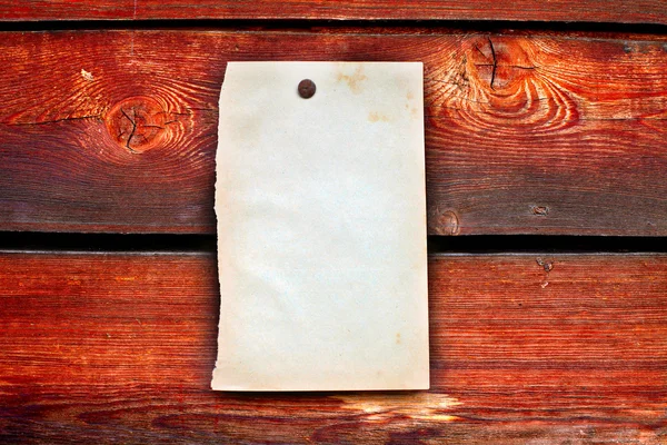 Carta bianca su sfondo di legno — Foto Stock