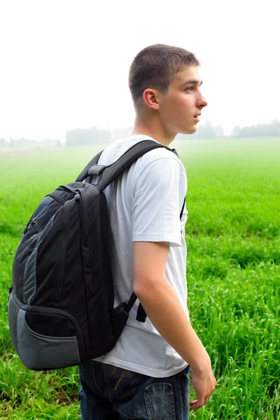 Teenager in the field — Stock Photo, Image