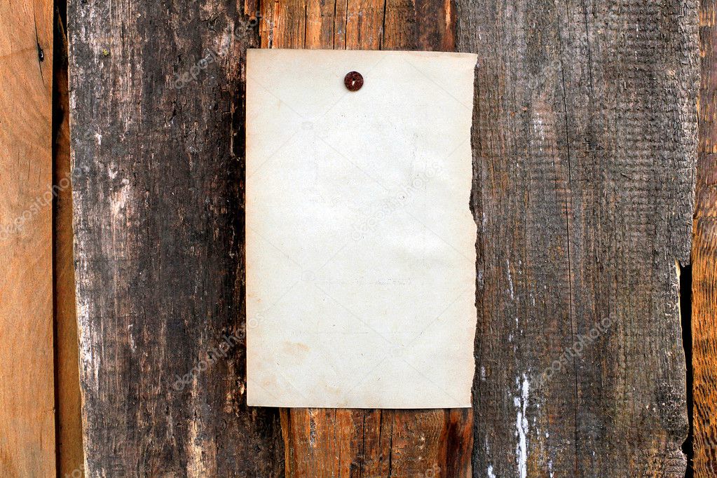 Blank paper on wooden background