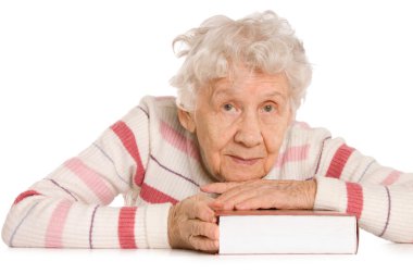 The elderly woman reads the book clipart